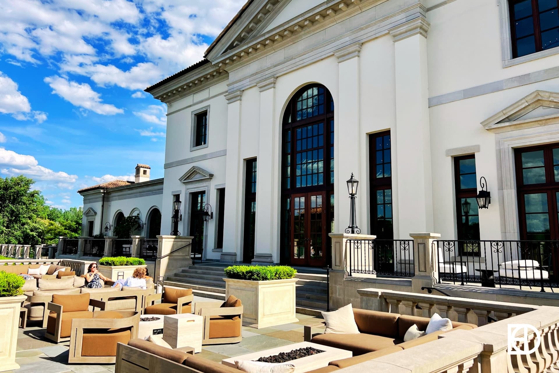 Exterior photo of RH Indy DeHann estate, showing the back patio