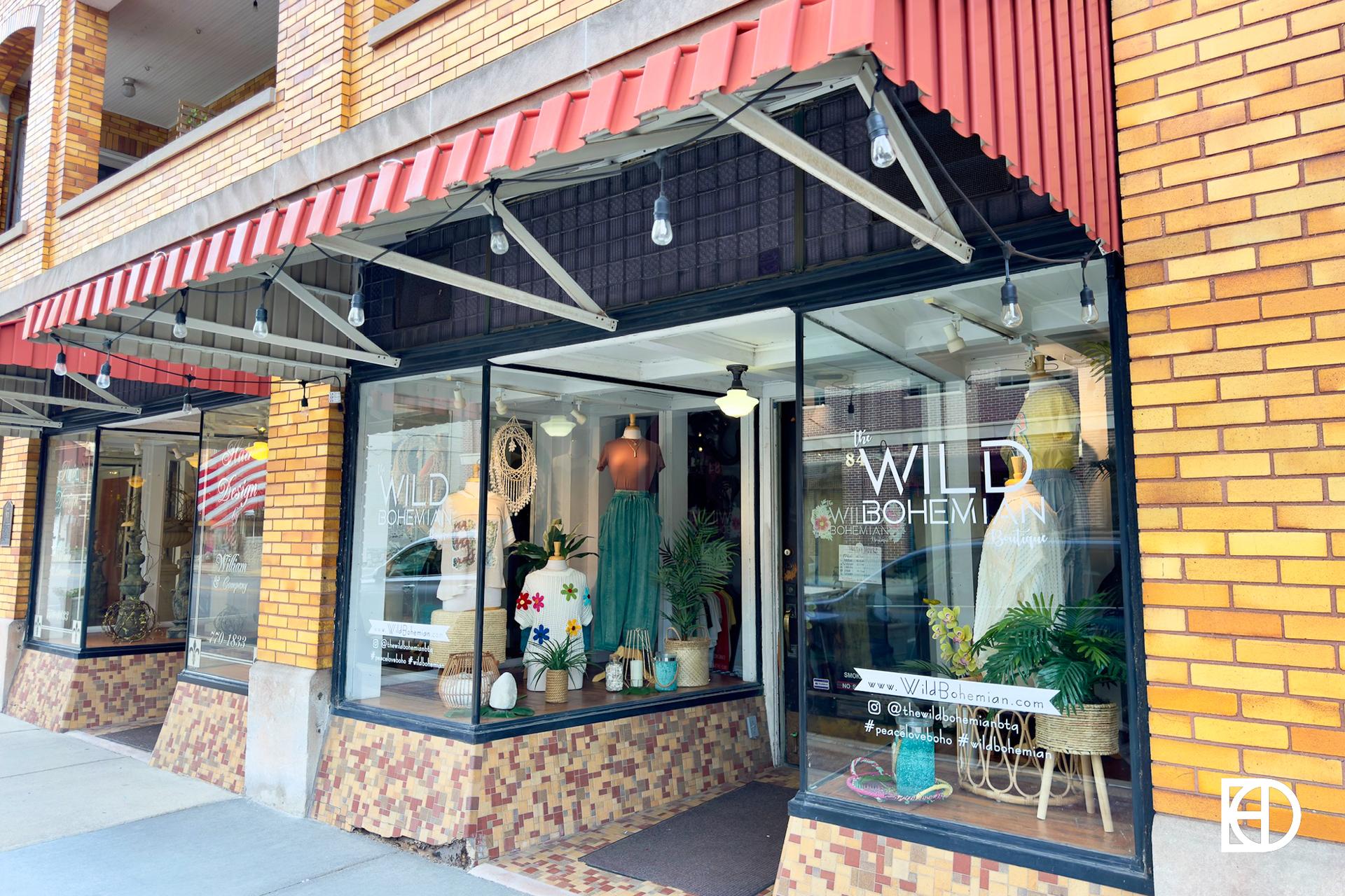 Exterior photo of entrance and window displays at Wild Bohemian