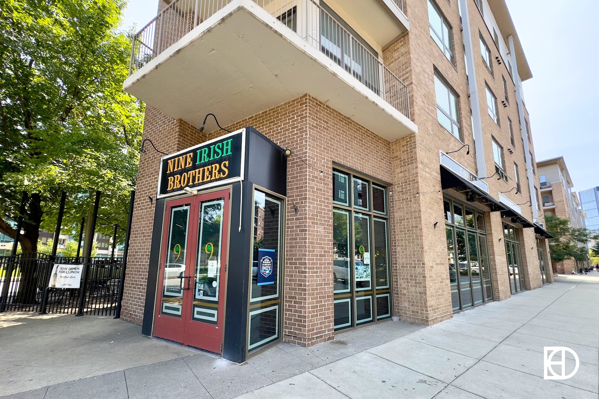 Exterior photo of Nine Irish Brothers, showing entrance and sidewalk