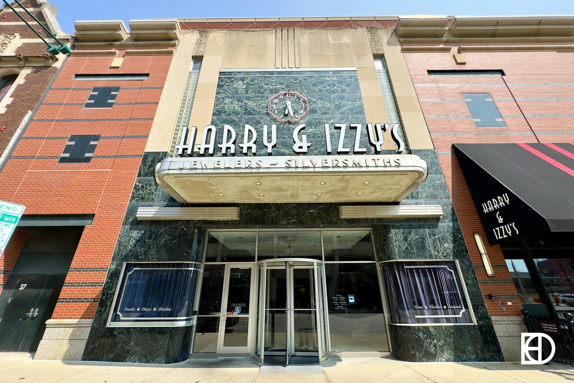 Exterior photo of Harry & Izzy's, showing signage and entrance