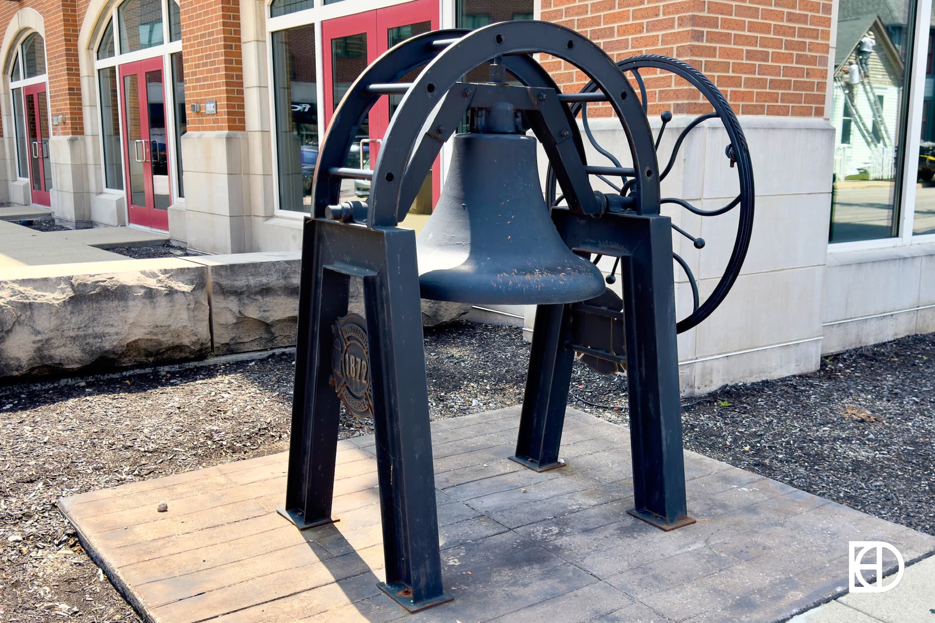 Exterior photo of Firefighters Museum, showing historic bell