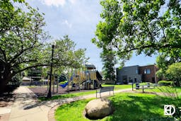 Photo of green space and playground at Herron-Morton Place Park