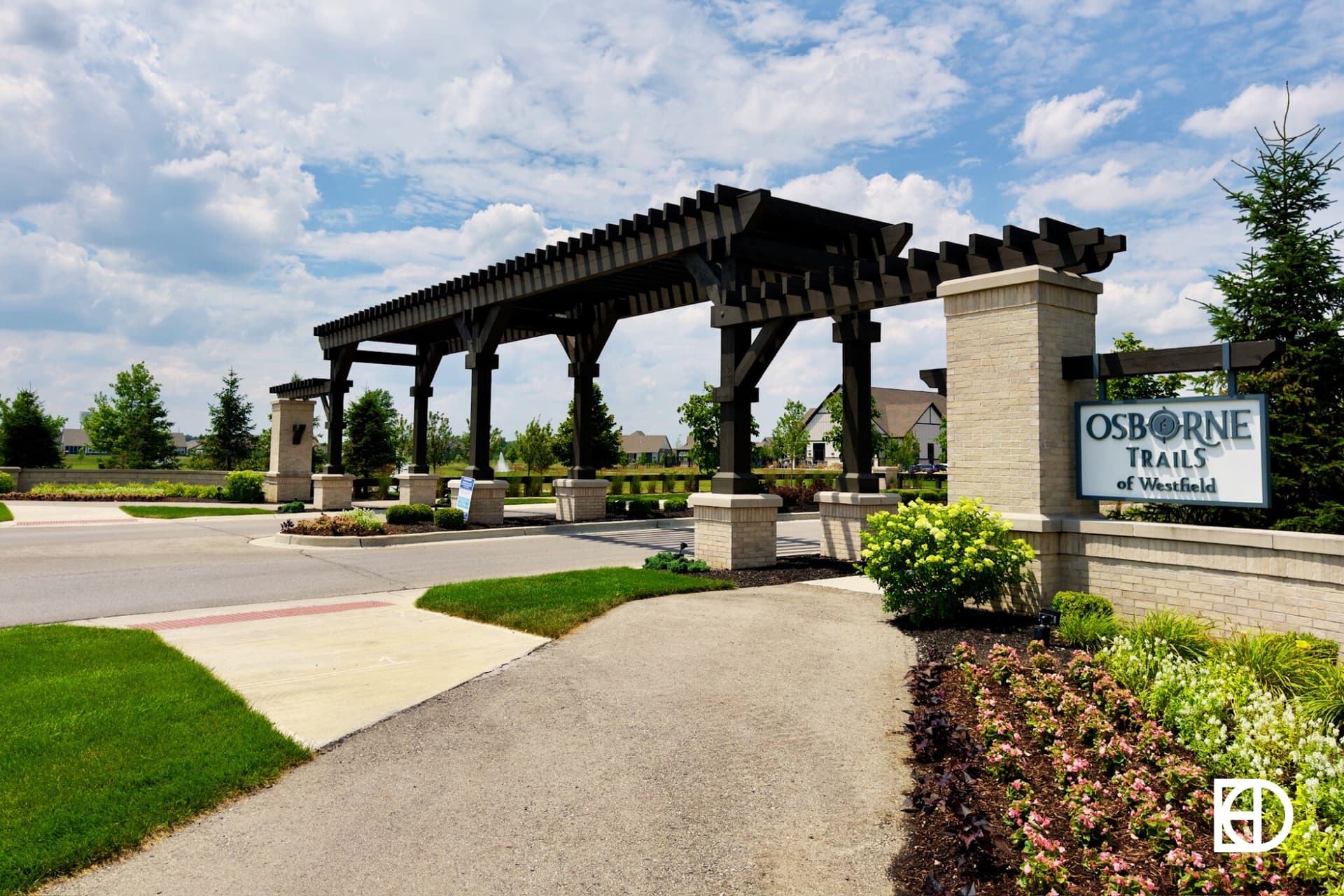 Photo of wood pergola over entrance to Osborne Trails of Westfield.