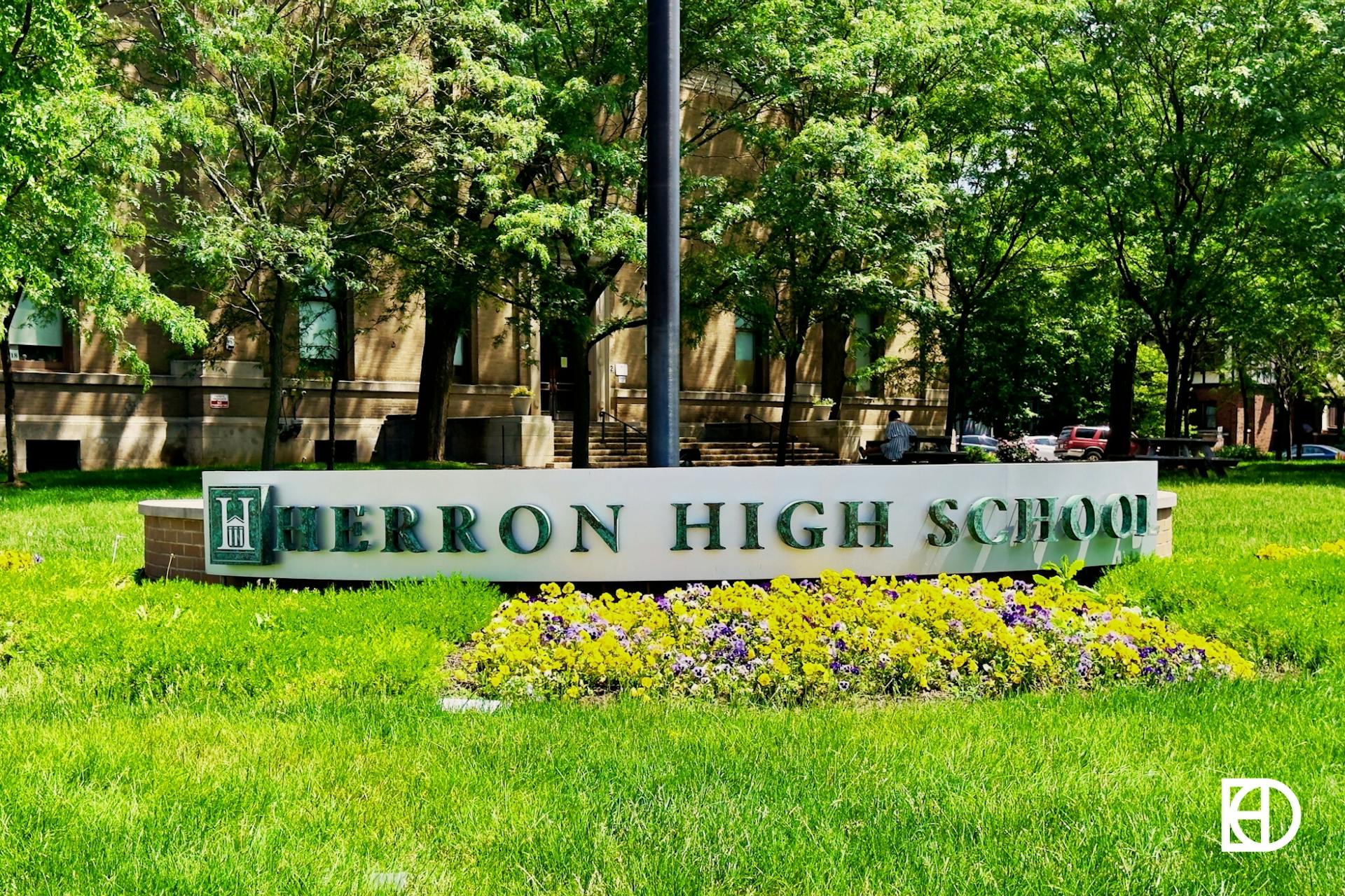 Photo of signage at Herron High School