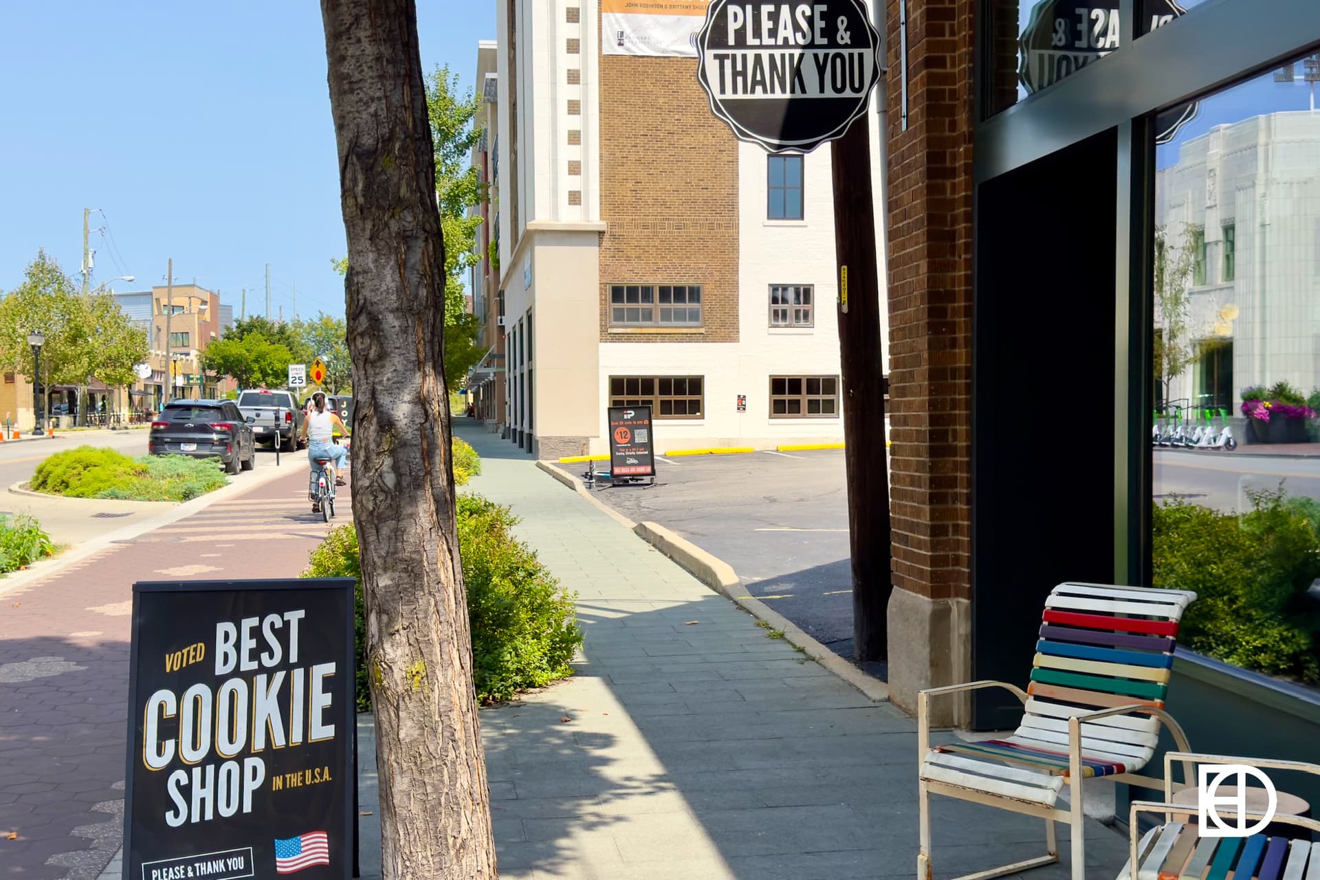 Exterior photo of Please & Thank You, showing entrance and sidewalk