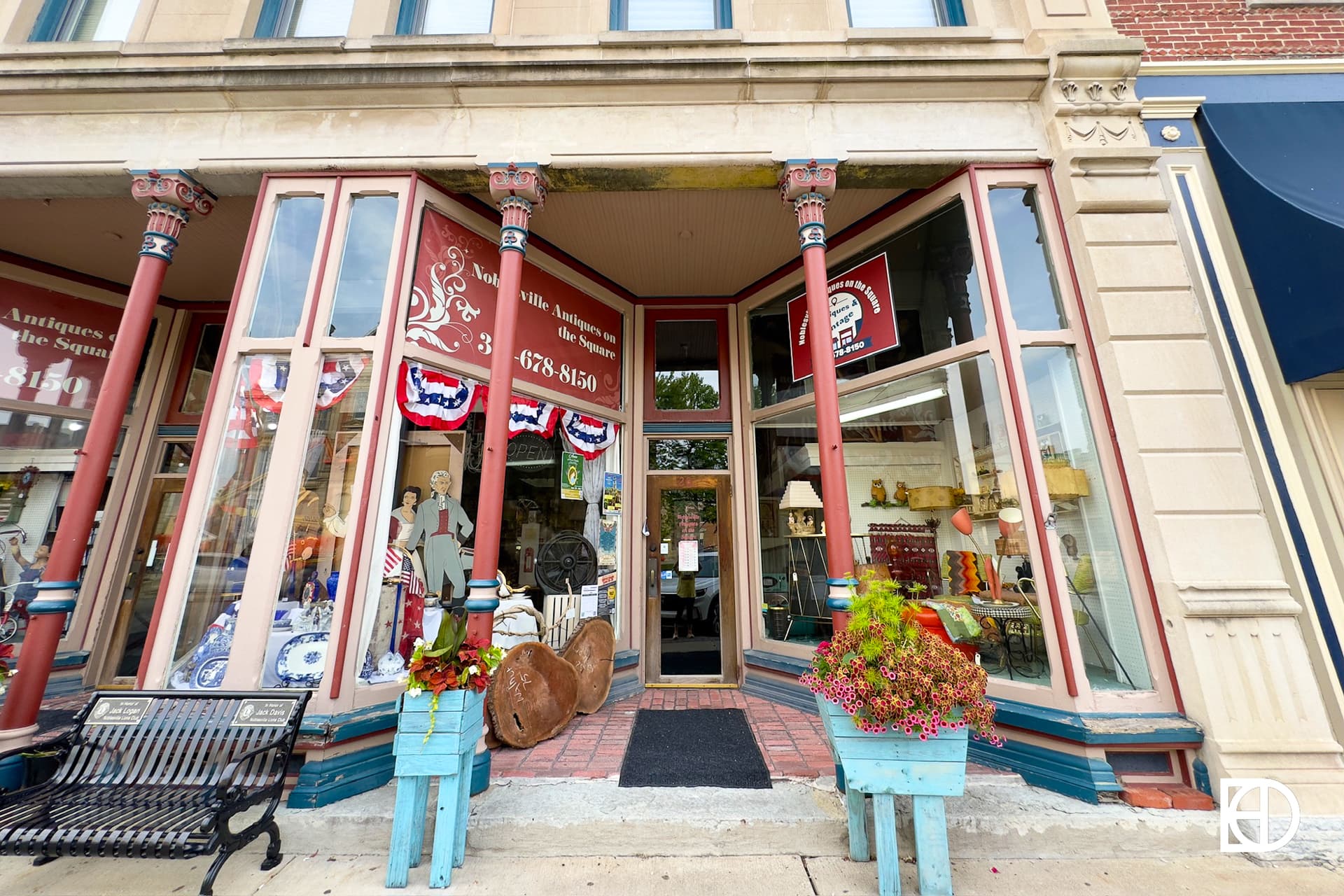 Exterior photo of Noblesville Antiques, showing landscaping, signage, and entrance