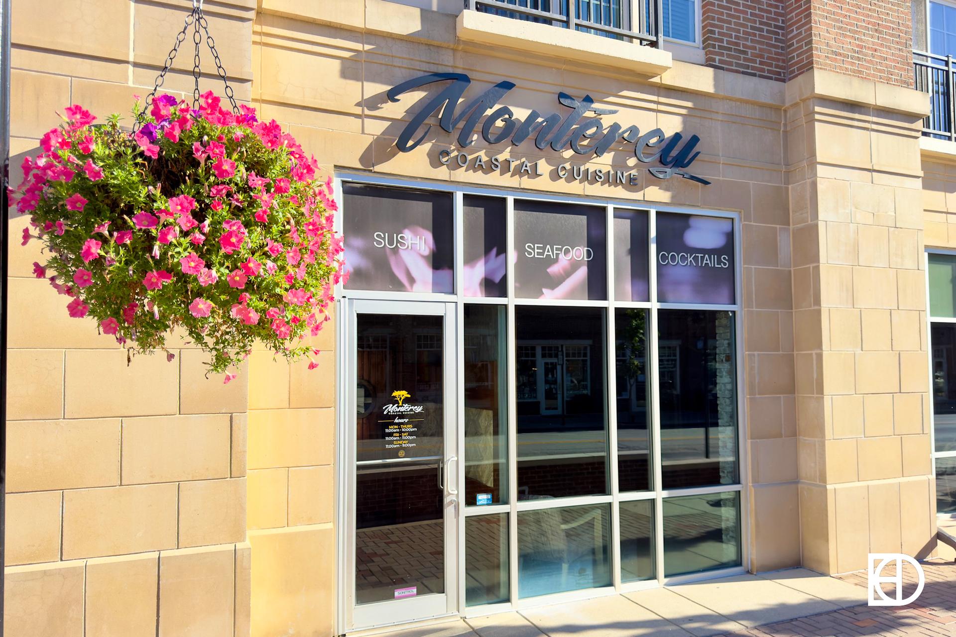 Exterior photo of Monterey Coastal Kitchen, showing signage and entrance