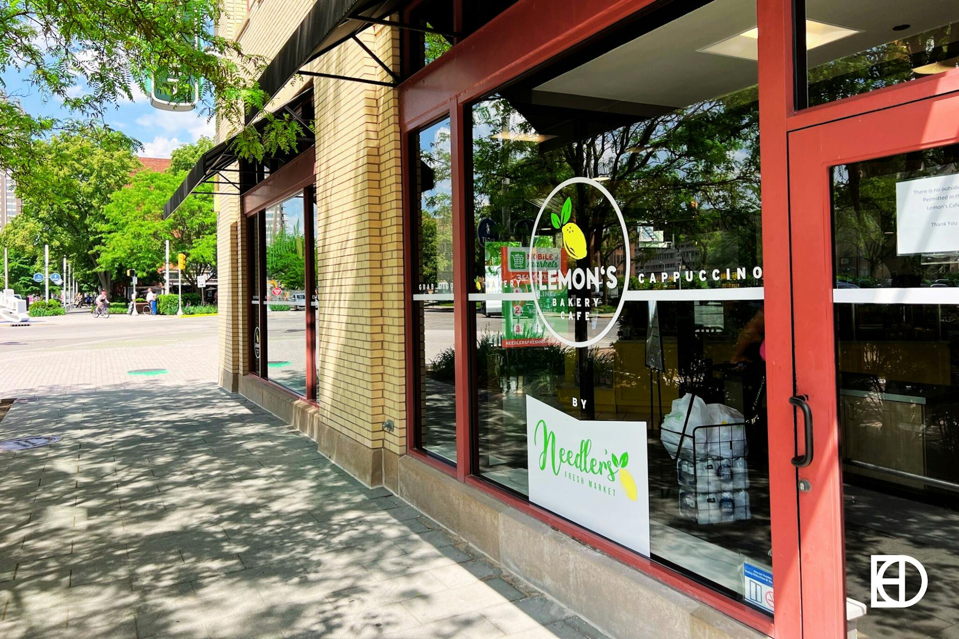 Exterior photo of Needler's Fresh Market in Downtown Indianapolis showing signage
