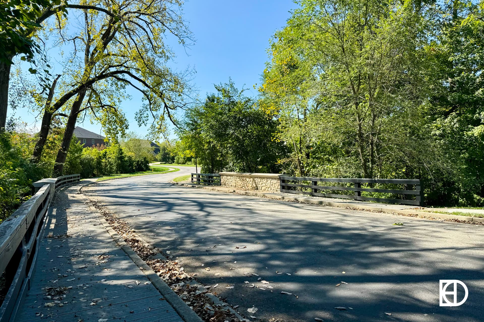 Exterior photo of Woods at Lion Creek, showing paths and landscaping