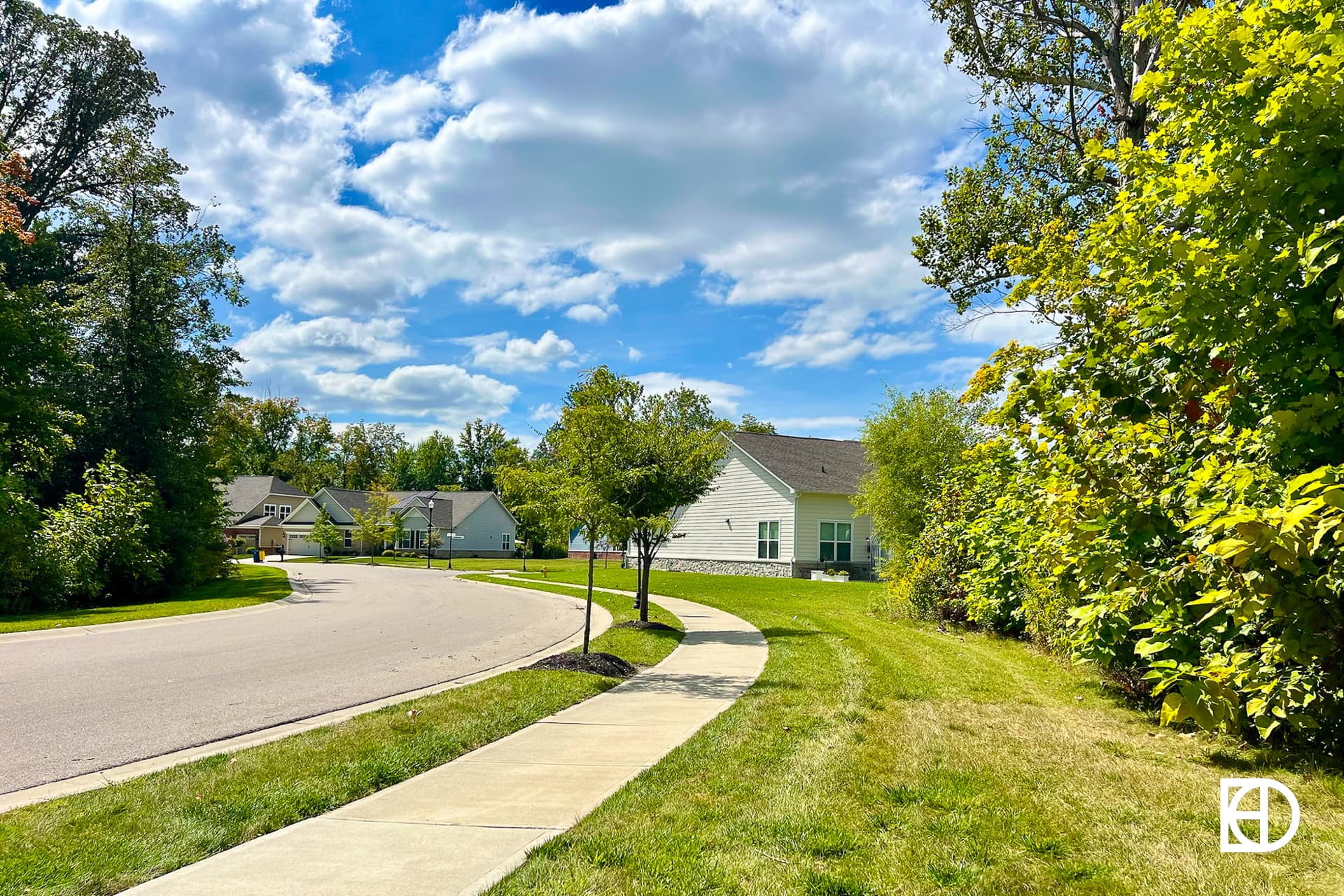 Exterior photo of Shadow Wood, showing sidewalks and homes