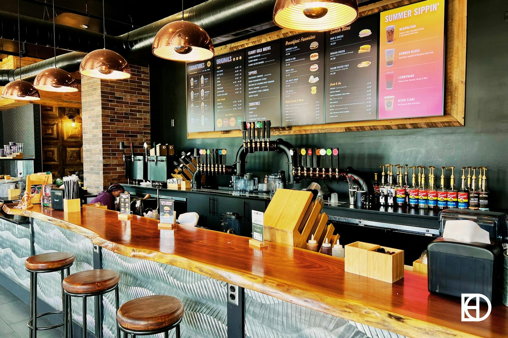 Indoor photo of Java House showing bar and seating