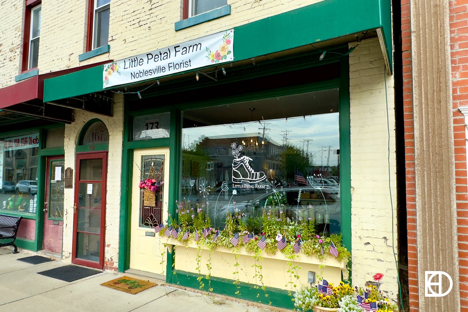 Exterior photo of Little Petal Farm, showing sidewalk and entrance