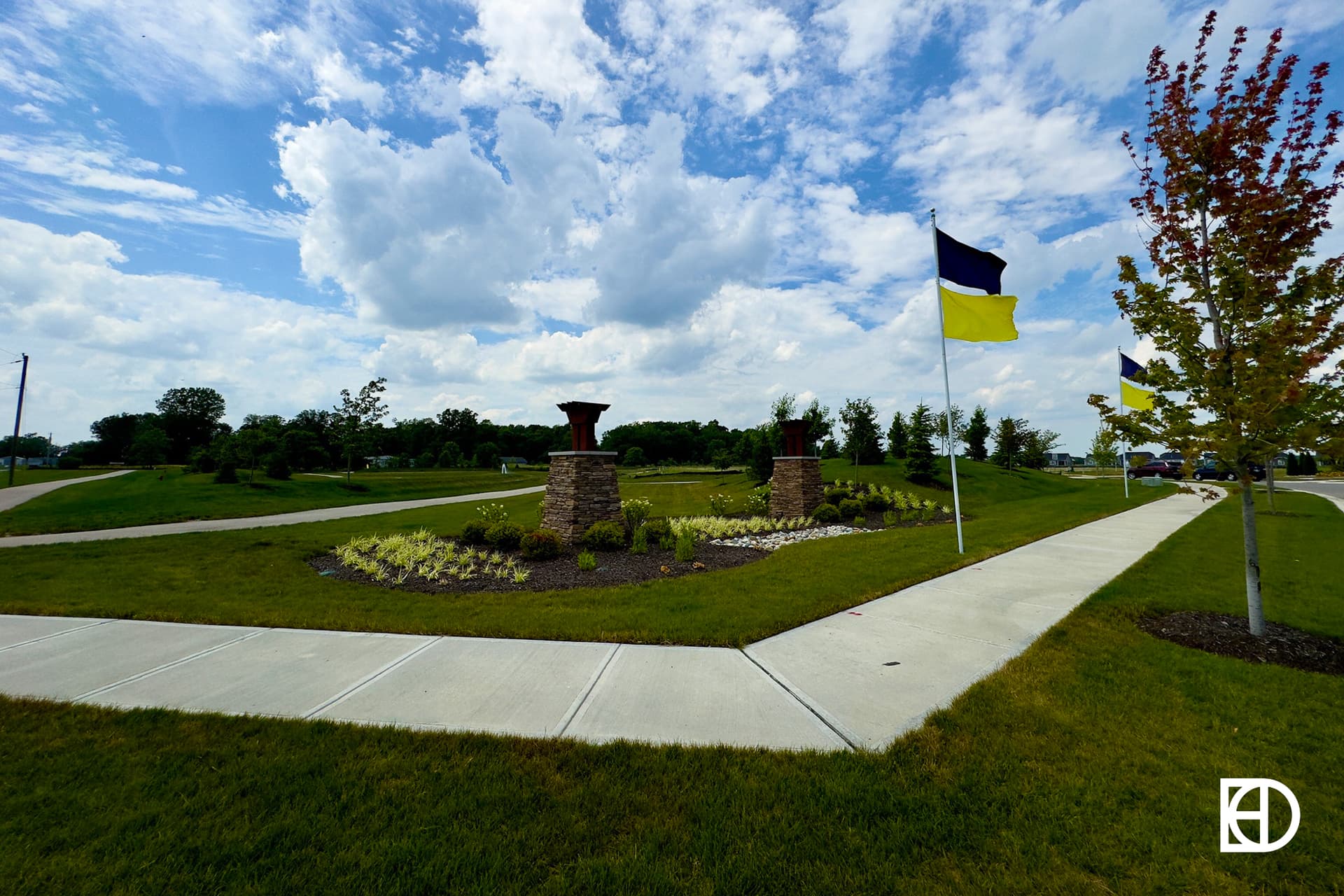 Walking paths with flags and landscaping in Atwater in Westfield.