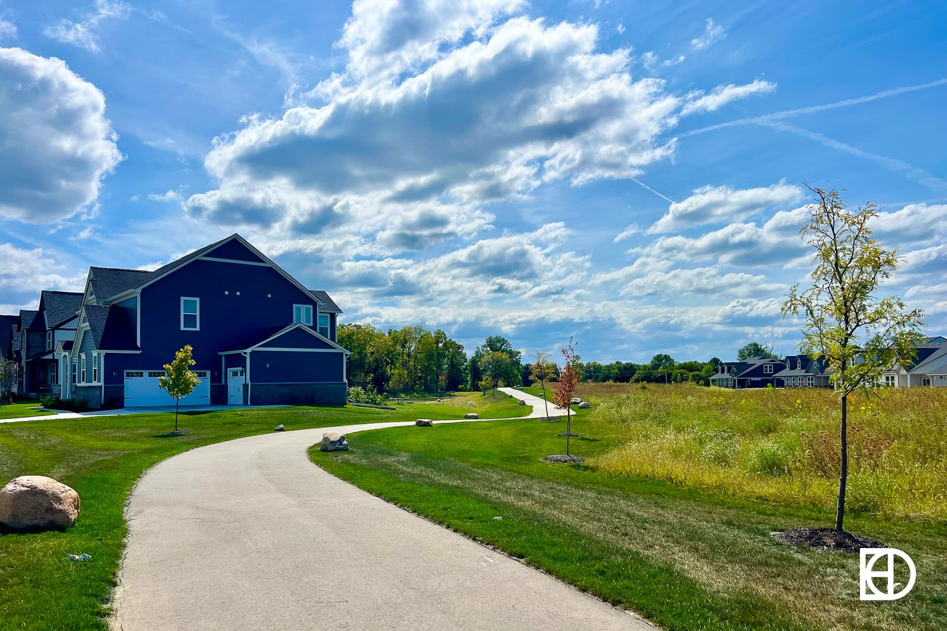 Exterior photo of Tallyn's Ridge, showing walking paths and landscaping