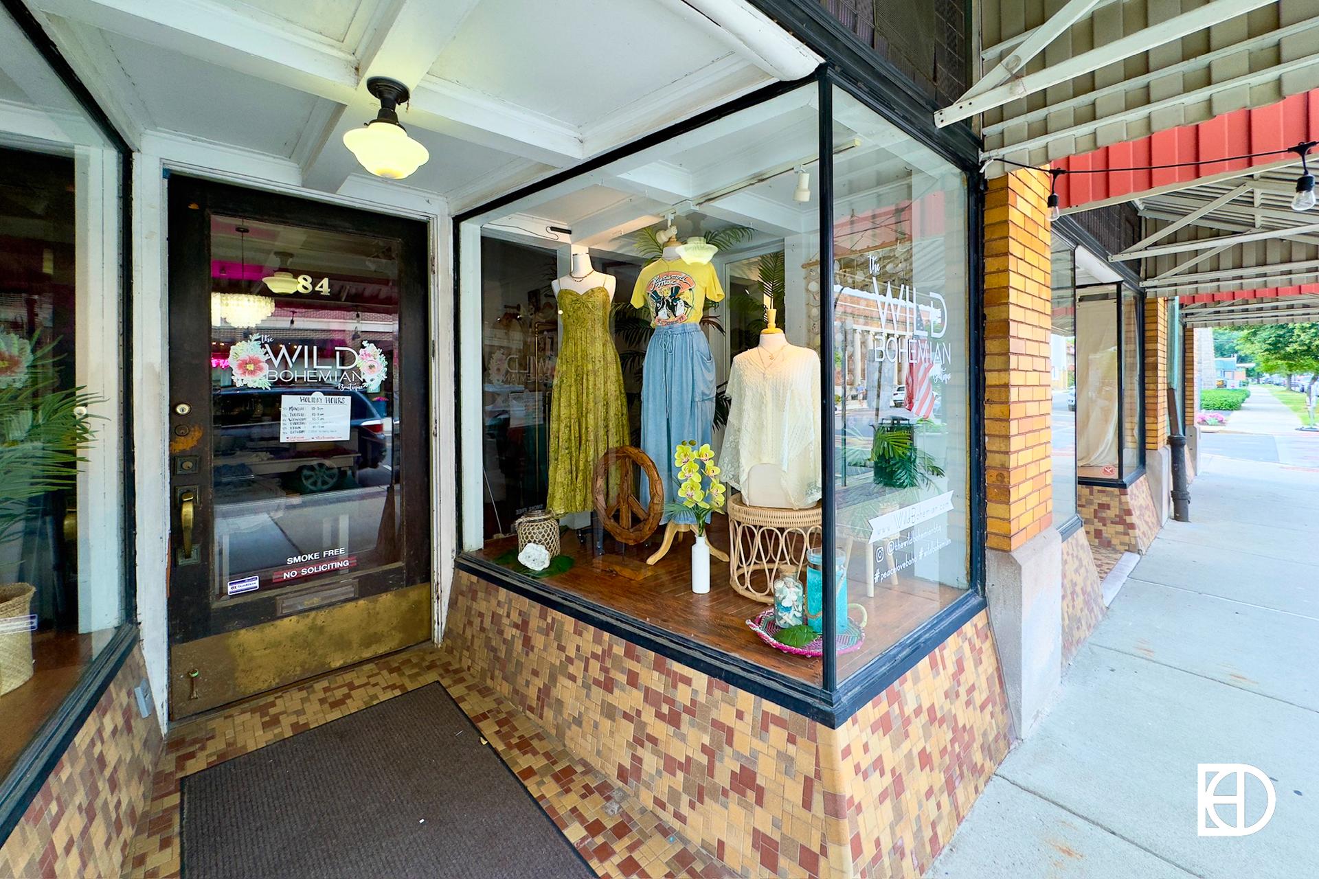 Exterior photo of entrance and window displays at Wild Bohemian