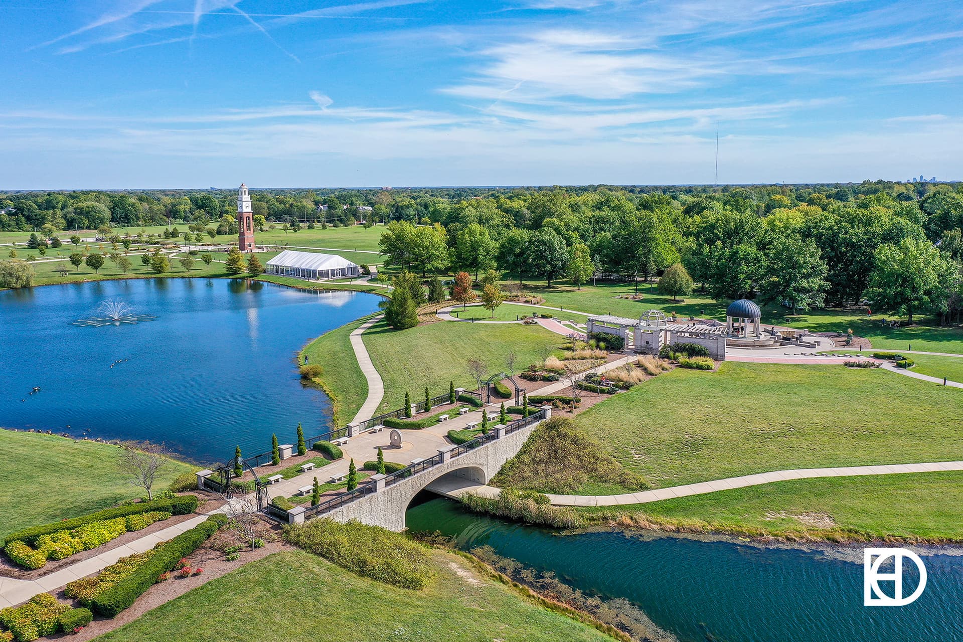 Aerial overview shot of most park elements showing one bell tower, pavilion and Centerpiece