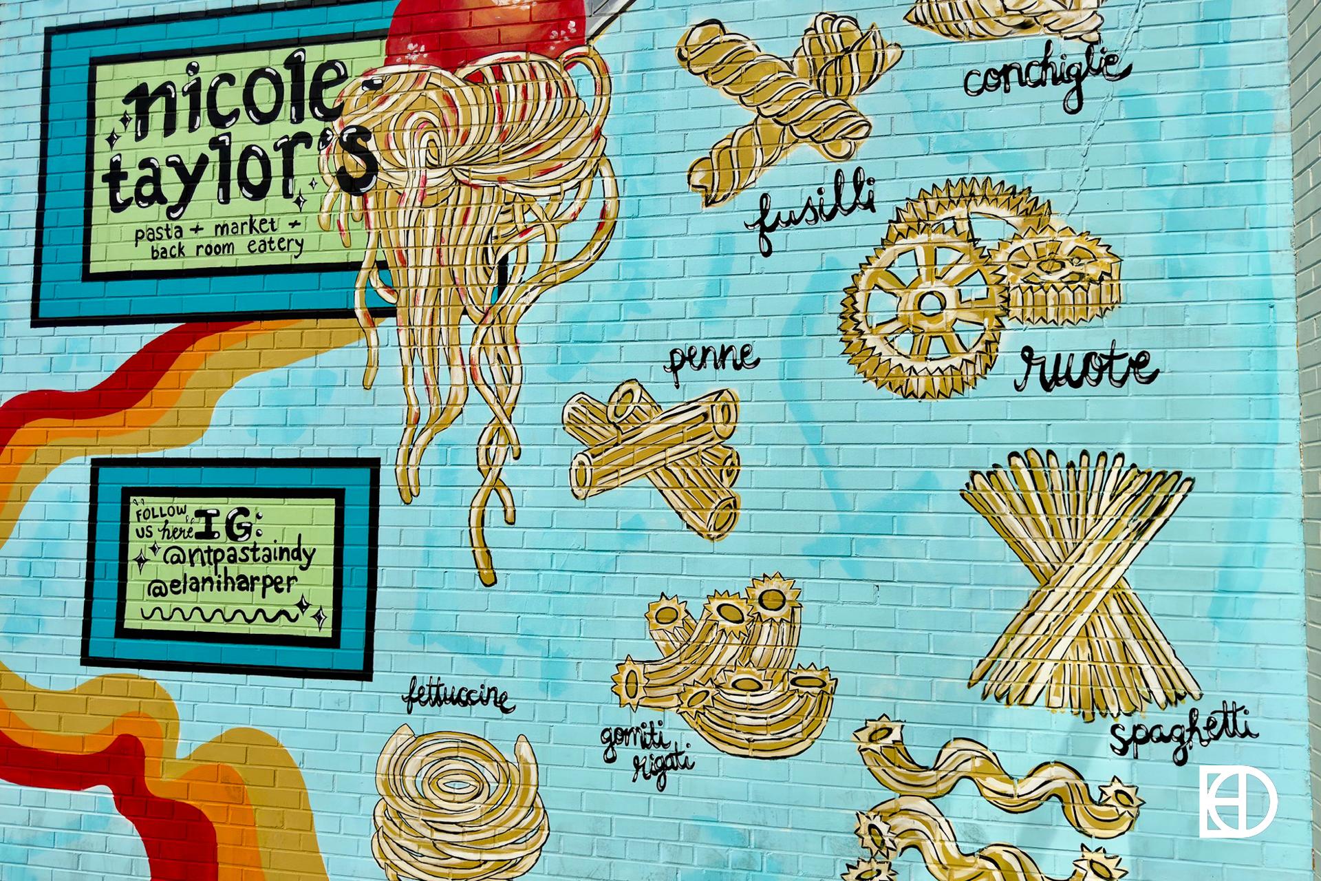 Exterior photo of Nicole Taylor's, showing mural of pasta