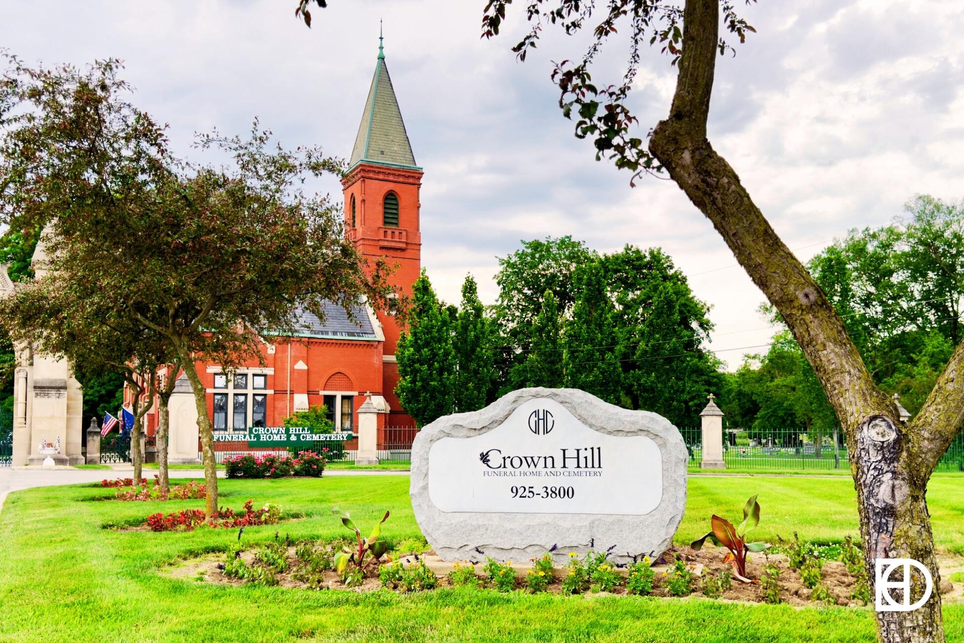 Exterior photo of Crown Hill Cemetery, showing entrance and historic building