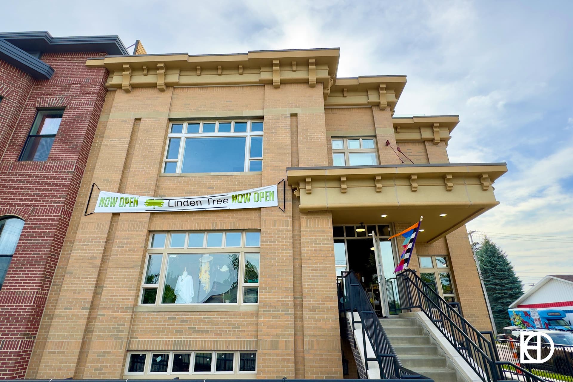 Exterior photo of Linden Tree, showing sidewalk and entrance