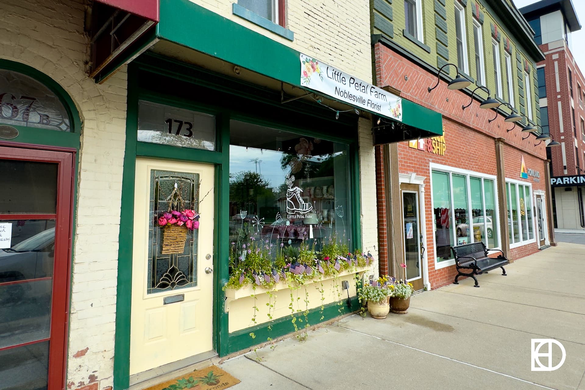 Exterior photo of Little Petal Farm, showing sidewalk and entrance