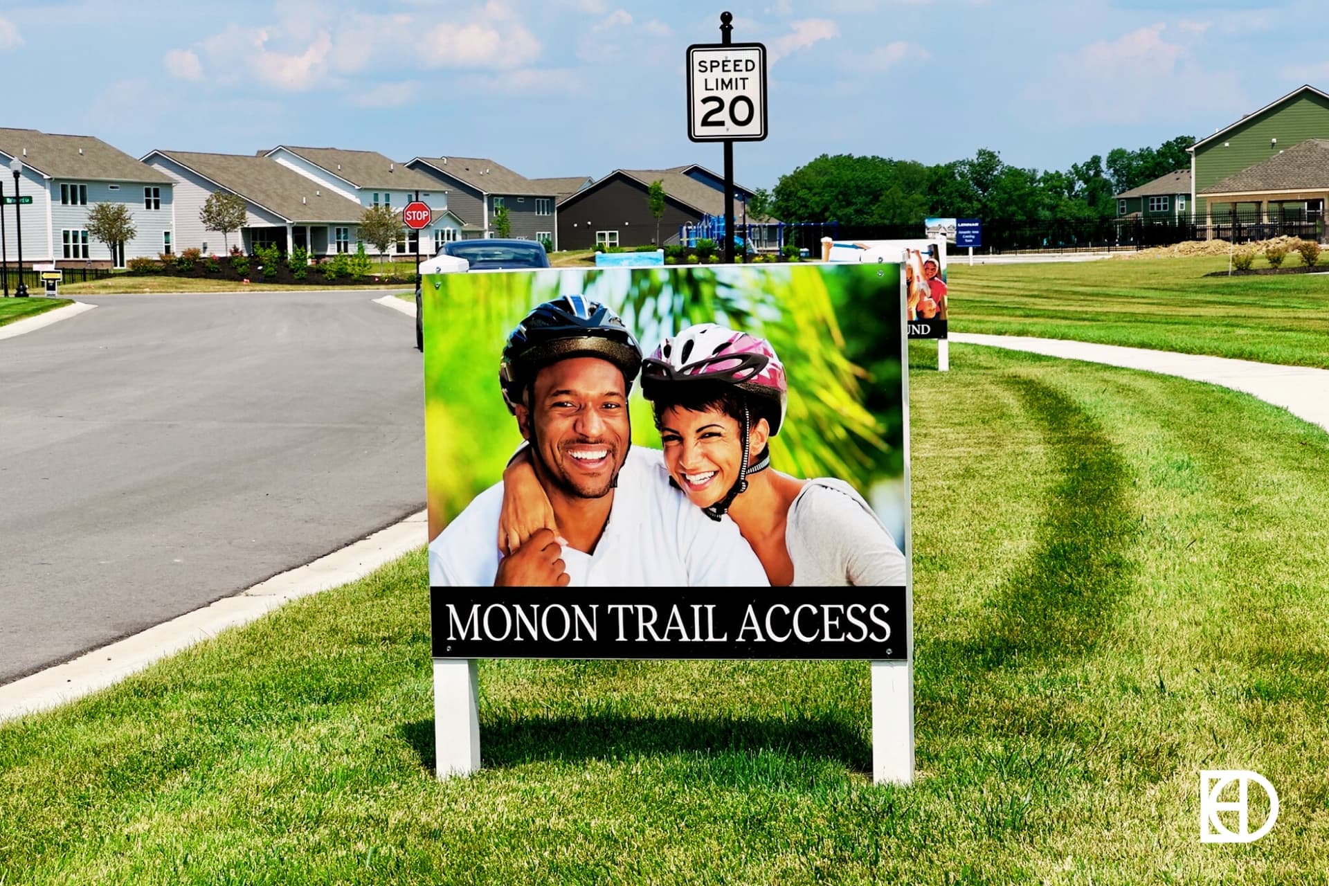 Advertising sign promoting Monon Trail Access in Aberdeen neighborhood.