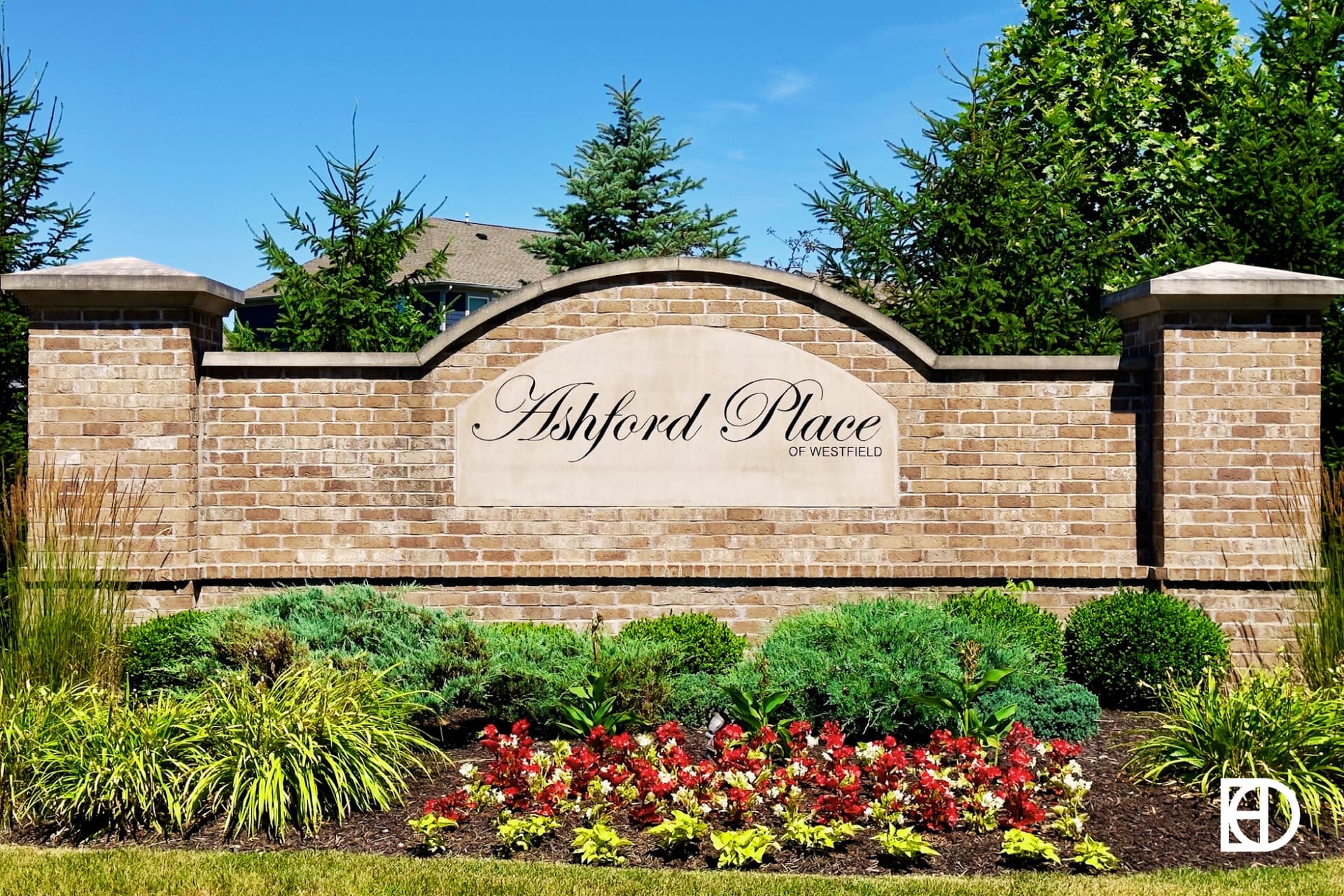 Exterior photo of Ashford Place, showing signage and landscaping