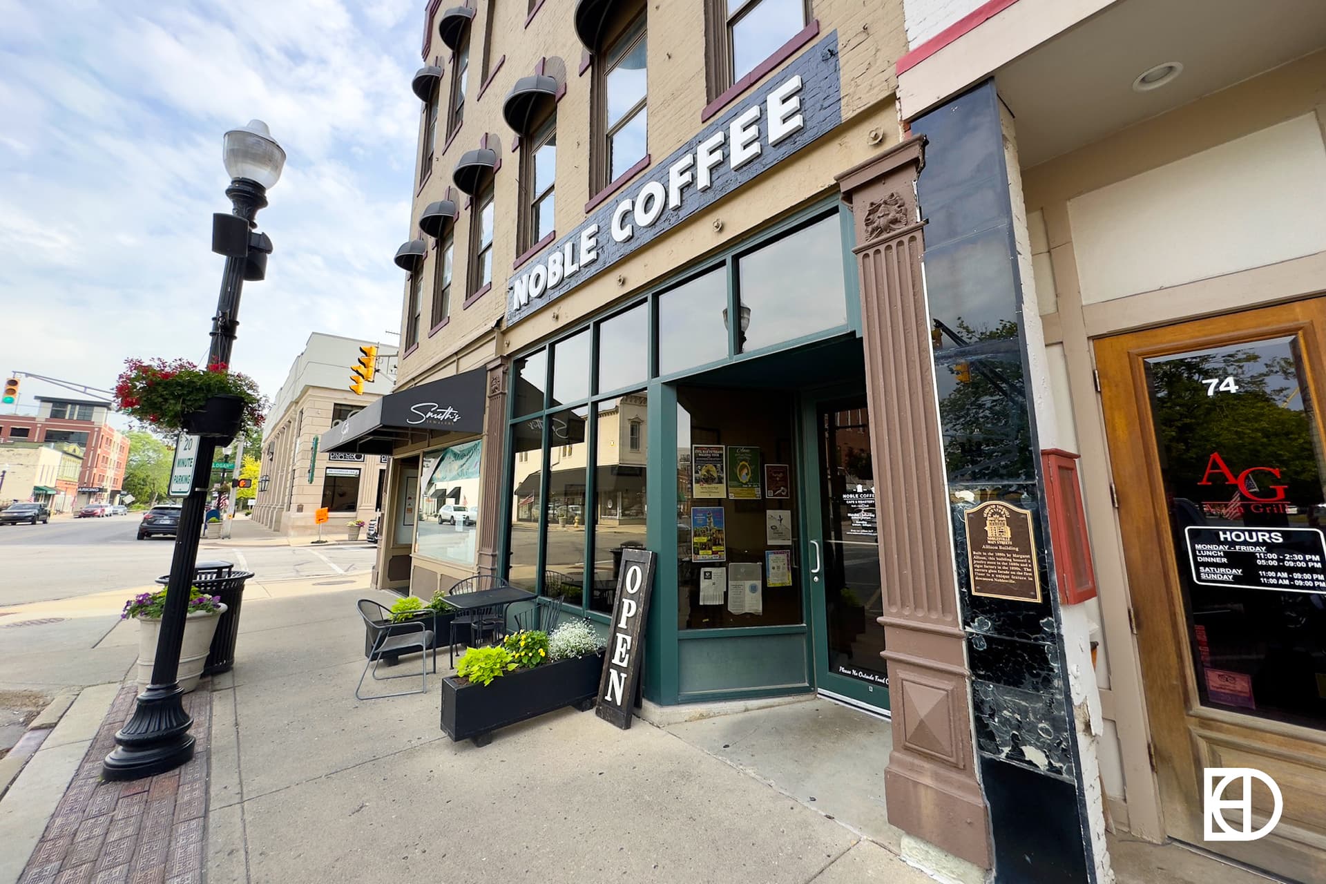 Exterior photo of Noble Coffee, showing signage and entrance