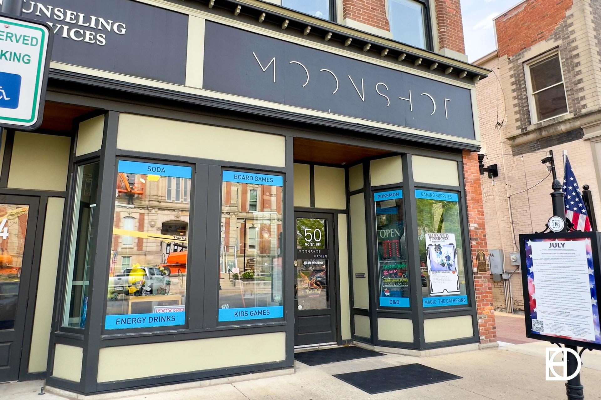 Exterior photo of Moonshot Games, showing entrance and signage