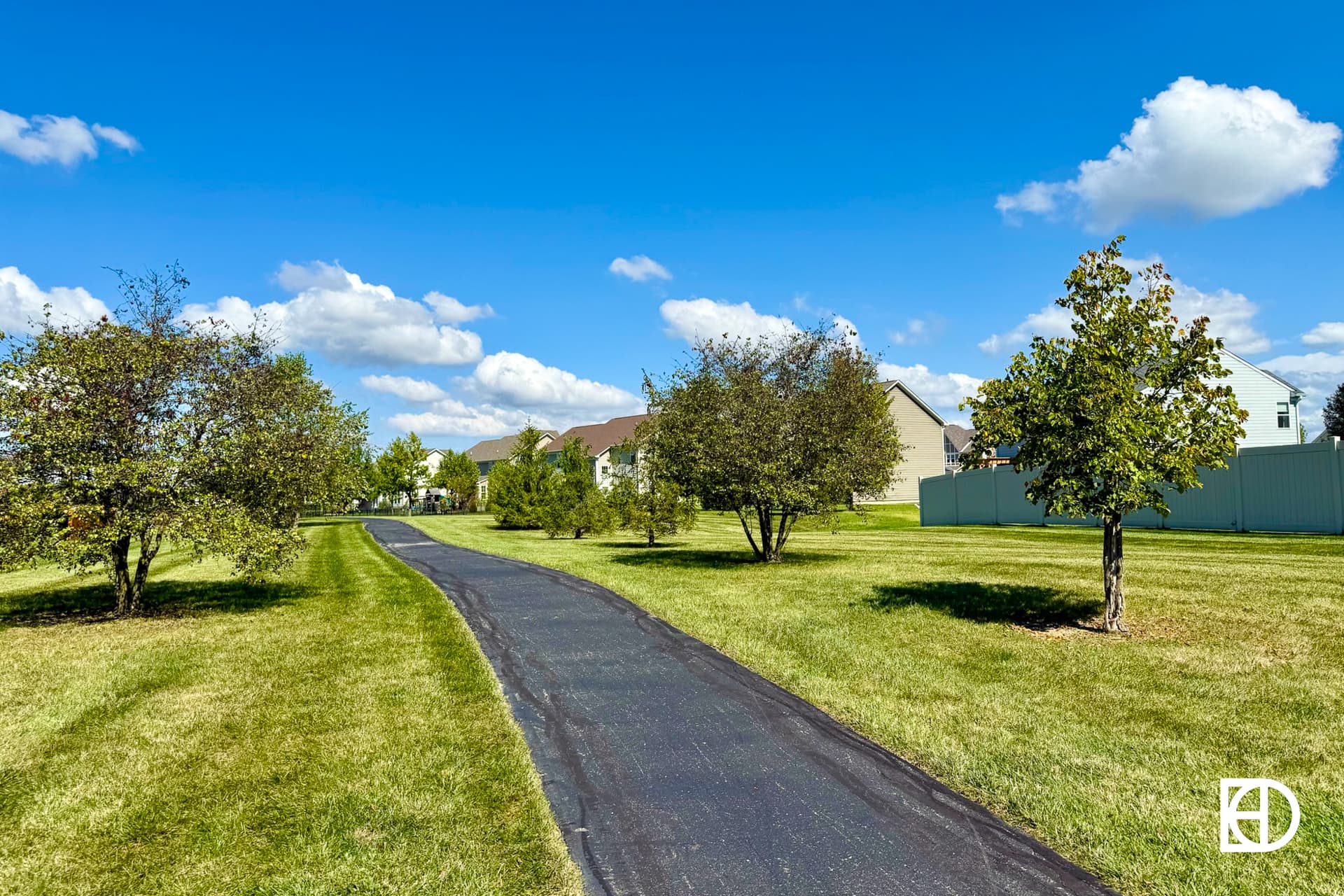 Exterior photo of Ridge at Hayden Run, showing paths and landscaping