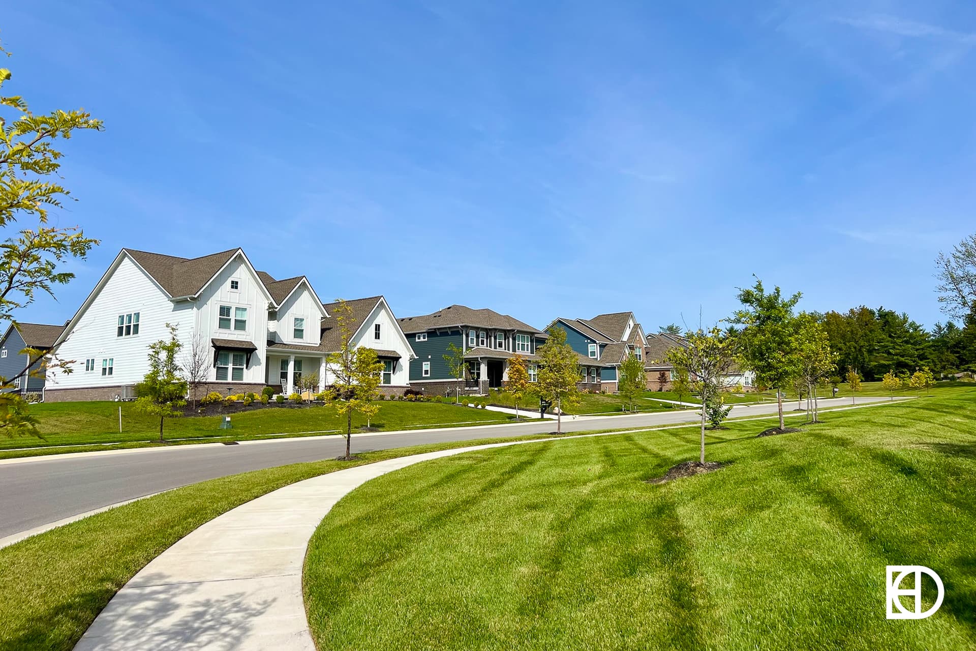 Exterior photo of Troy Estates, showing homes and landscaping