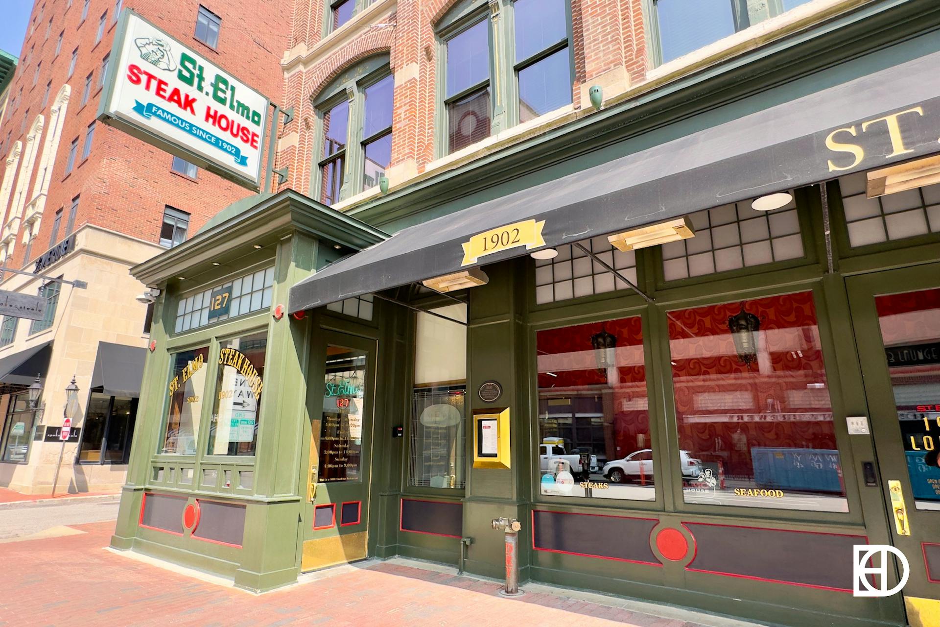 Exterior photo of St. Elmo Steakhouse, showing signage and entrance