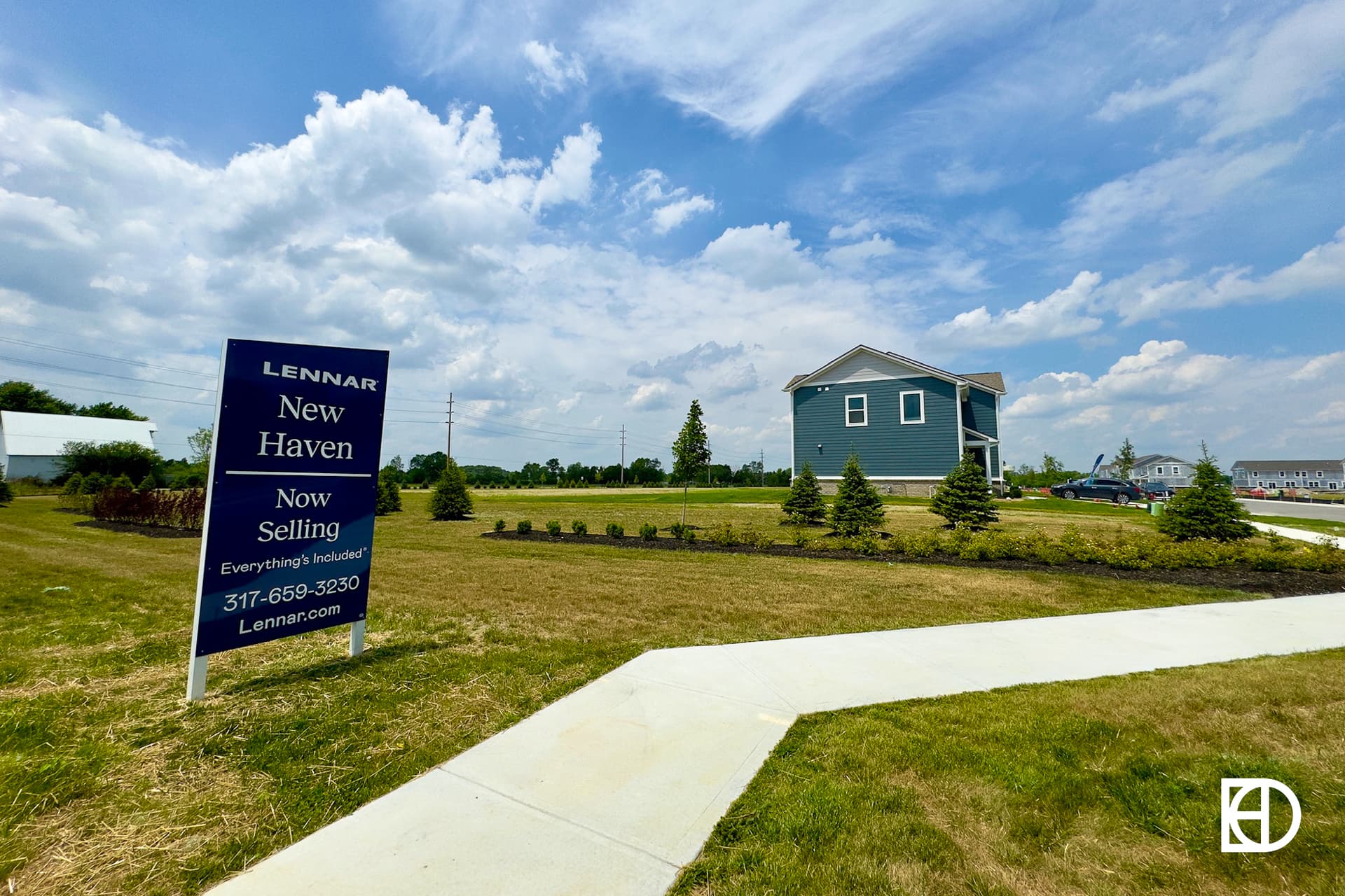 Photo of new construction home in New Haven with Lennar sales sign in foreground.