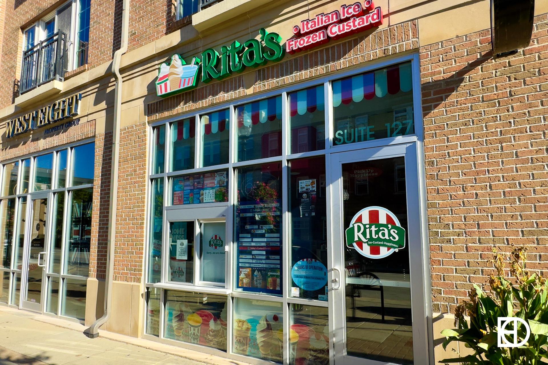 Exterior photo of Rita's, showing entrance and signage